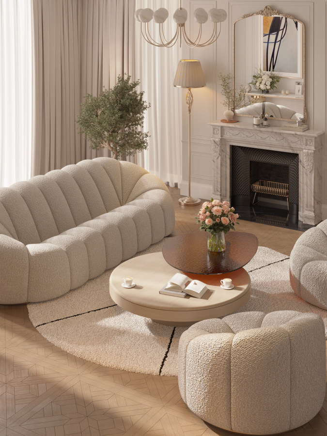 Soft neutral-toned living room with curved armchairs, a sculptural sofa, and marble fireplace — designed by Maison Révèle to evoke intimacy and elegance.
